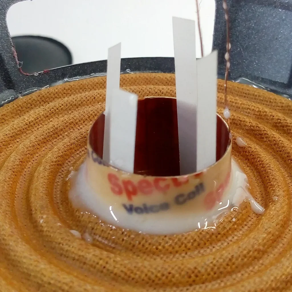 Attaching the voice coil to the spider