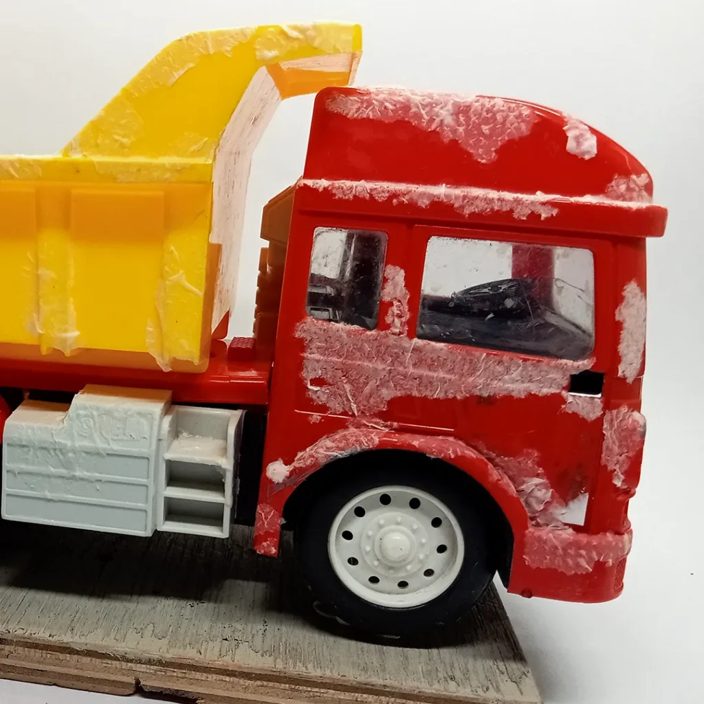 Created a rough texture on the truck body surface using tissue paper.