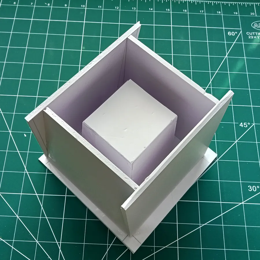 both inner and outer trapezoidal structure fixed on to the base for homemade concrete flower pot